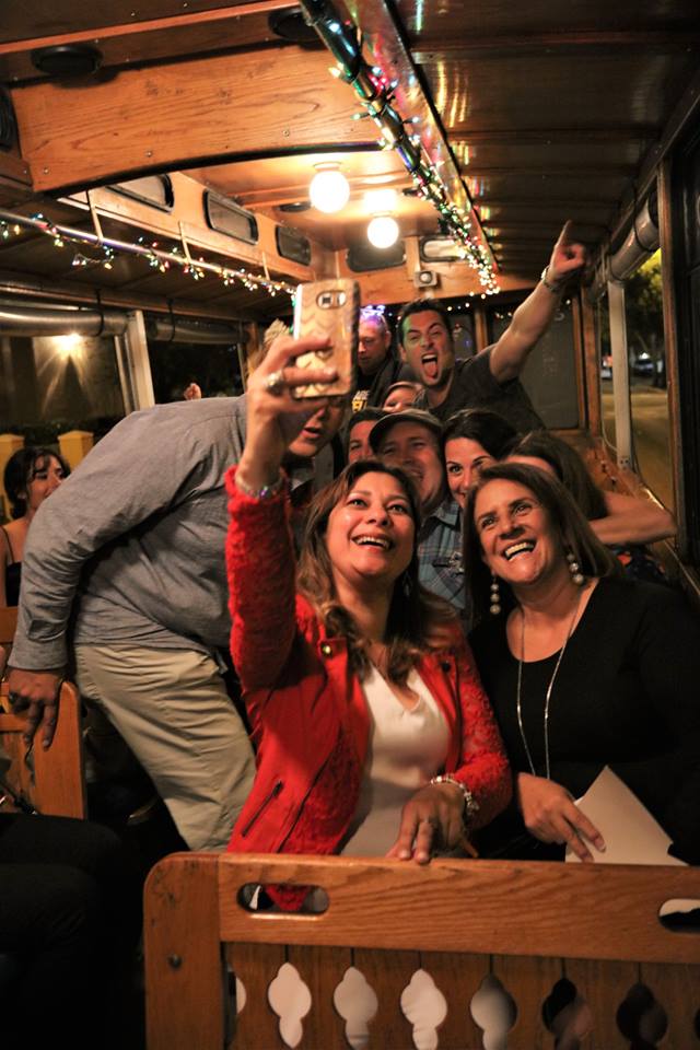 Attendees taking pictures on the trolleys. Attendees taking pictures on the trolleys.