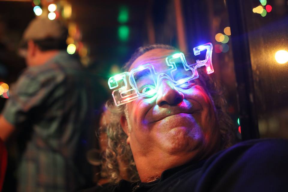 Have a blast at the New Year's Eve Trolley Event! Attendee wearing 2017 light up glasses from the 4th annual event.